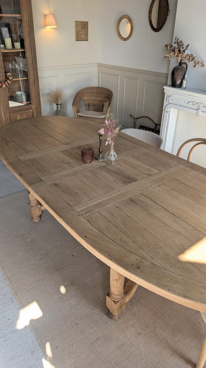 Table ovale en chêne avec rallonges