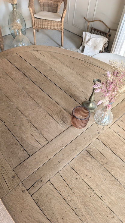 Table ovale en chêne avec rallonges