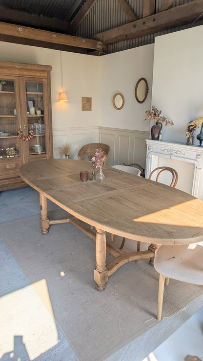 Table ovale en chêne avec rallonges