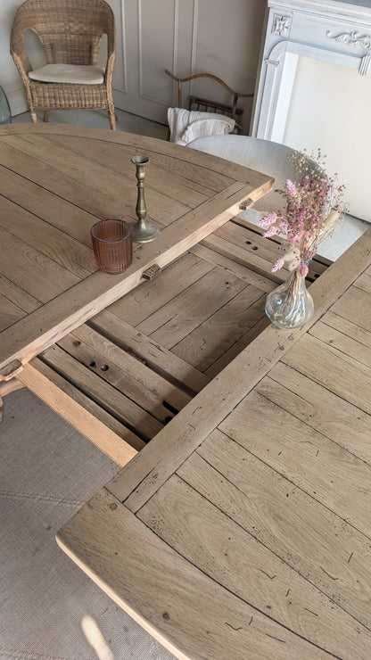 Table ovale en chêne avec rallonges