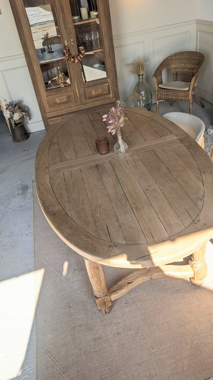 Table ovale en chêne avec rallonges